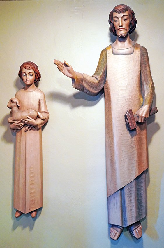 Statues of St. Joseph and the child Jesus, in St. Pius X Church in Moberly.